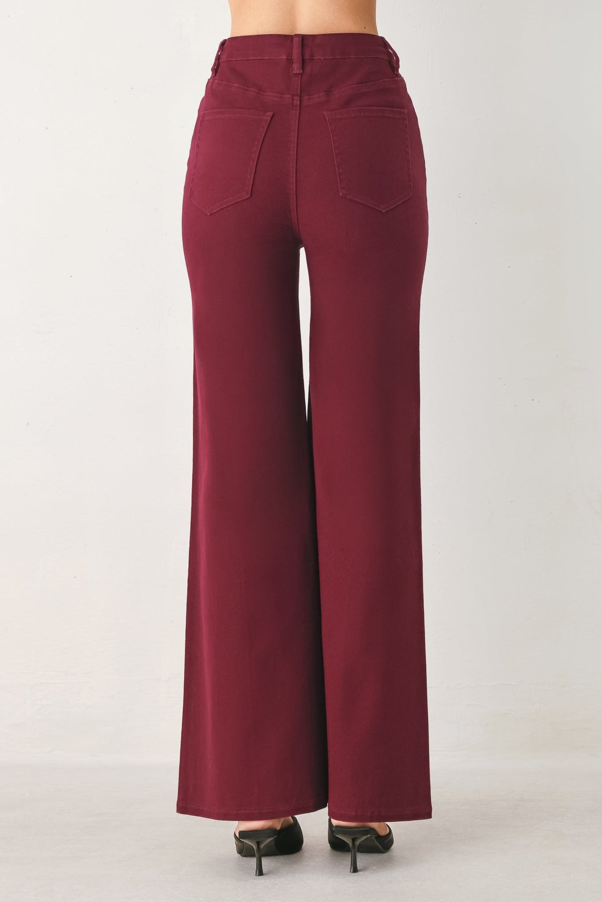 Women’s burgundy twill pants with high-rise wide legs and back yoke seam detail.