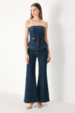 Indigo denim flare pants with high waist, belt loops, and wide flared hems