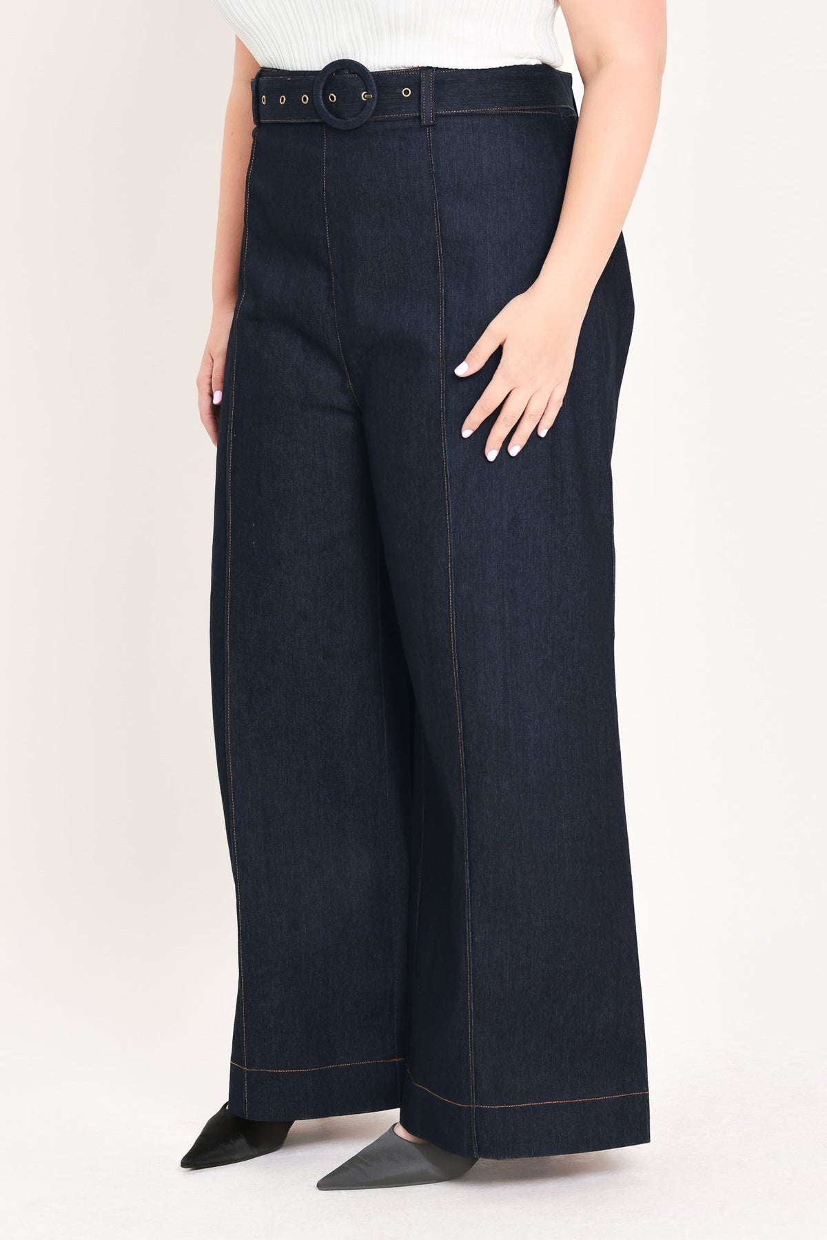Dark denim wide-leg pants with wide belt loops and button closure, contrast stitching