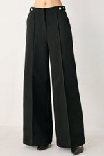 Black high-waisted woven palazzo pants with button-tab waistband and wide legs