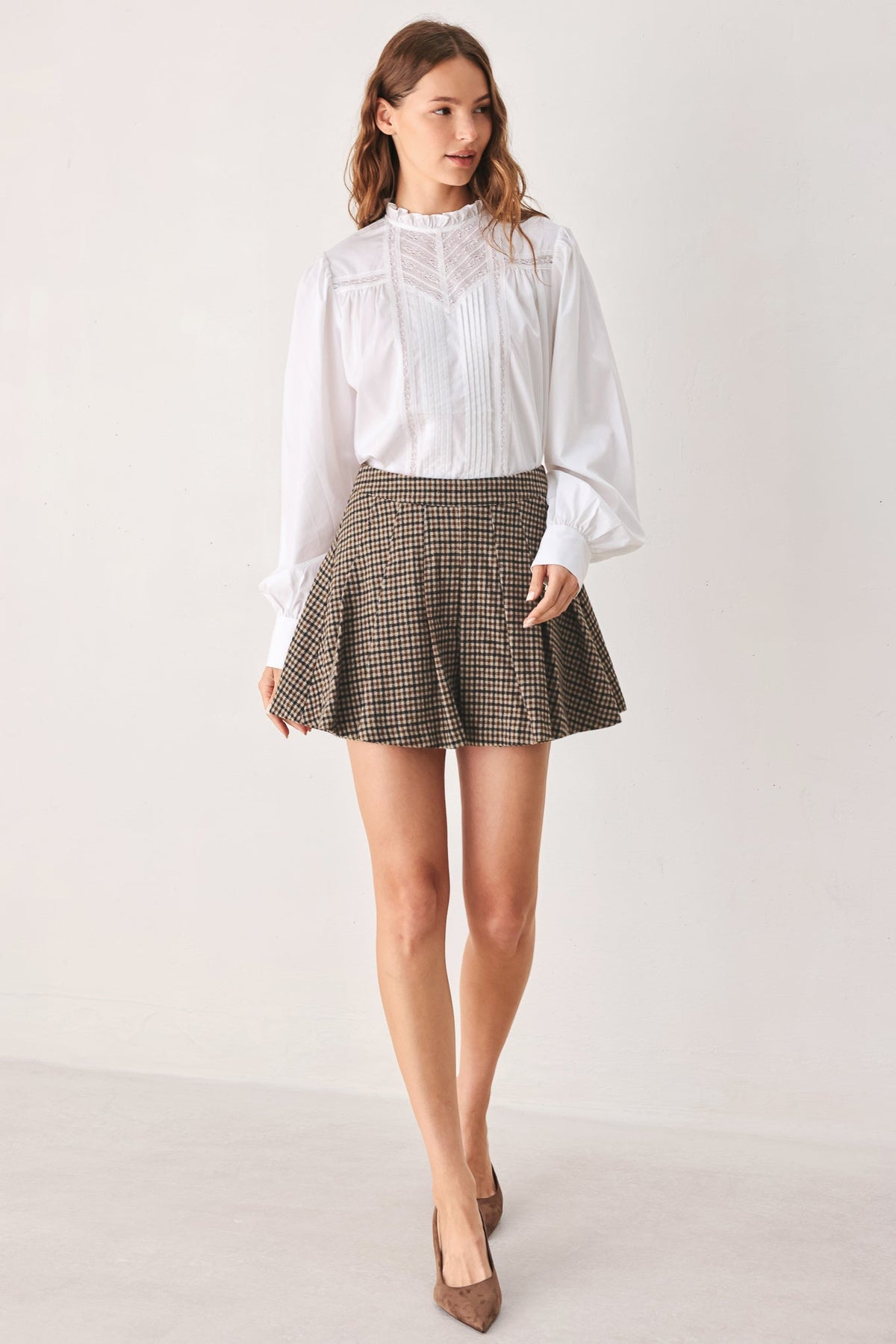 Brown tweed check skort with pleated front and flared mini length