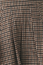 Tweed fabric texture in brown and black with fine check pattern weave