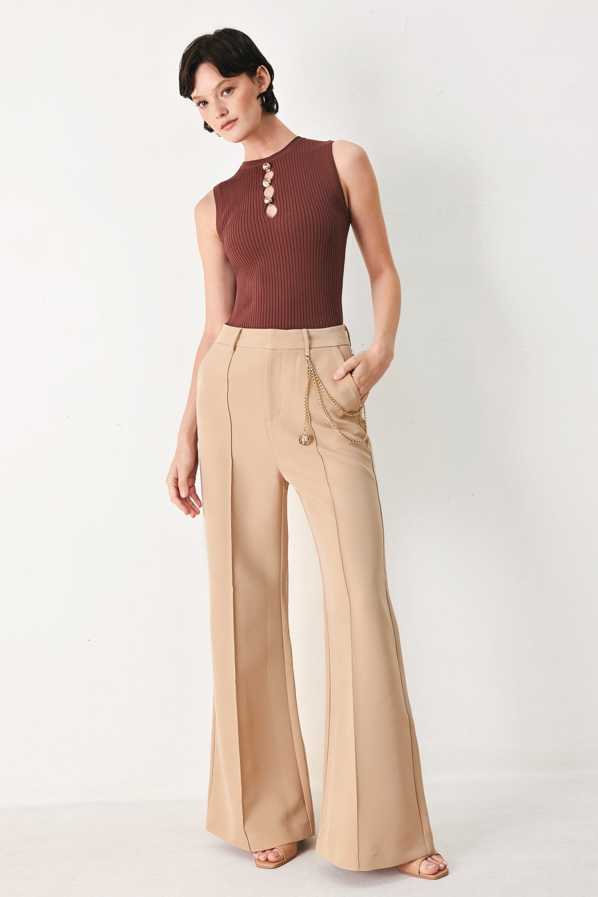 Camel high-rise woven pants with vertical seams and gold-tone chain tassel detail