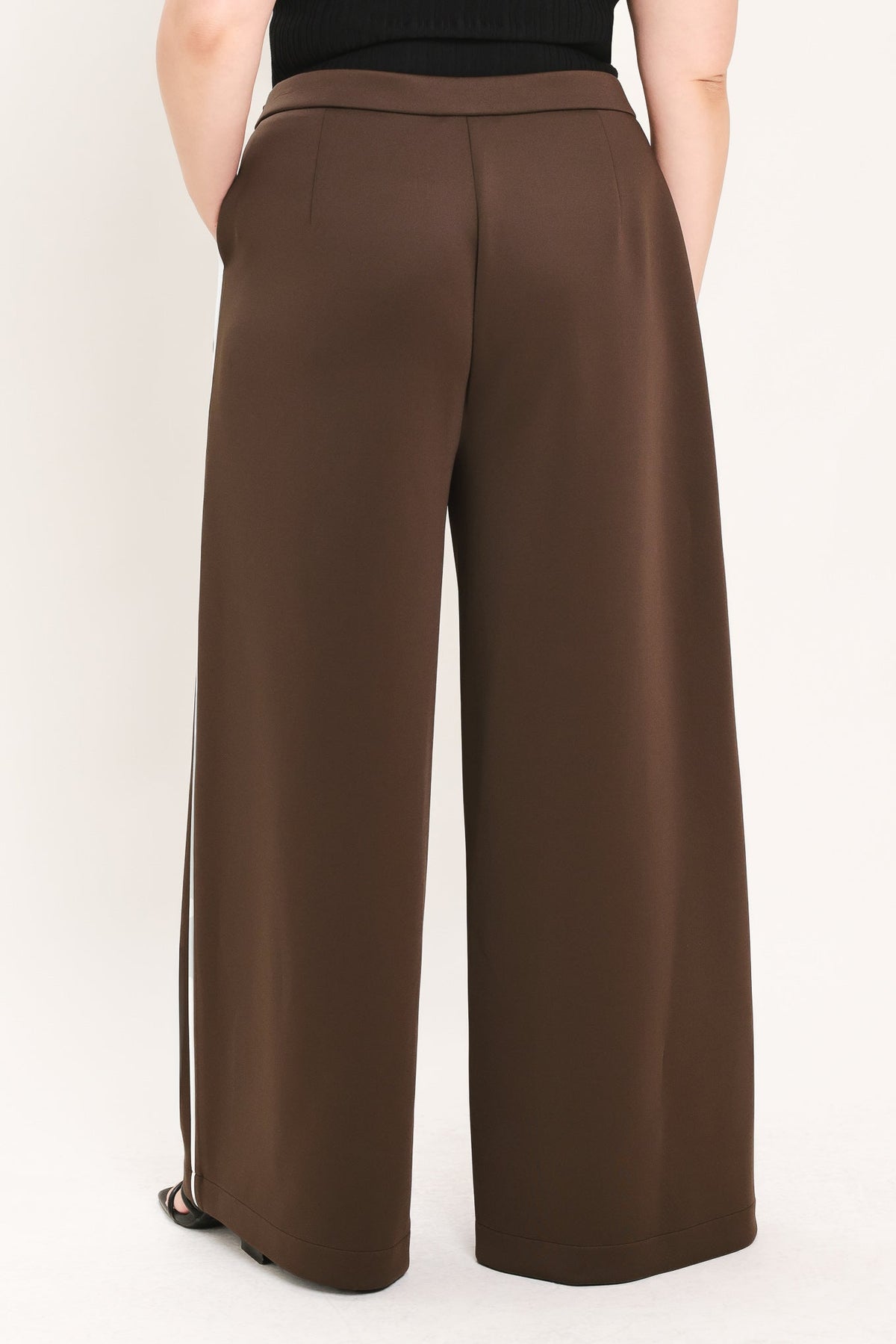 Brown wide-leg stretch pants with center back seam and vertical side stripe