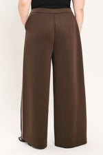 Brown wide-leg stretch pants with center back seam and vertical side stripe