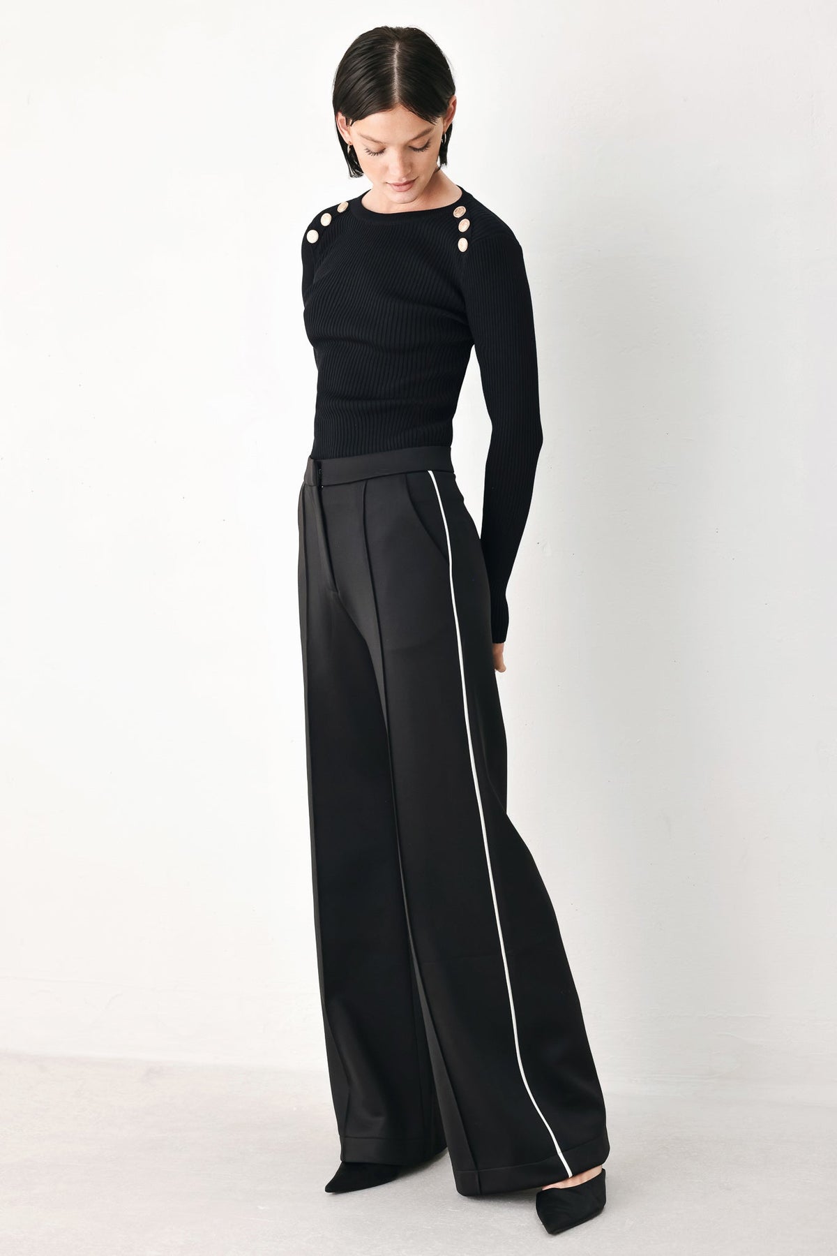 Black wide-leg woven pants with pintuck front and white side stripe, full view