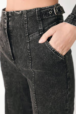 Black denim pants with button closure, belt loops, and front pocket