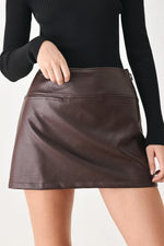 Brown faux leather skort with front seam and smooth A-line skirt overlay