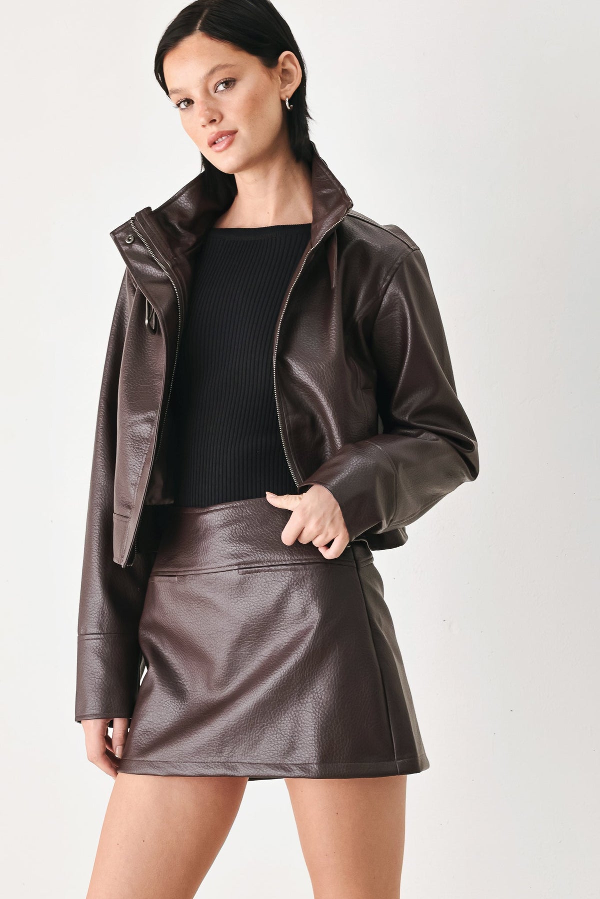 Brown faux leather skort mini skirt with clean waistband and gentle flare