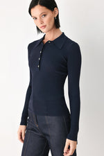 Navy ribbed knit polo top with long sleeves and button placket