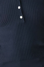 Navy ribbed knit polo fabric close-up with two white buttons