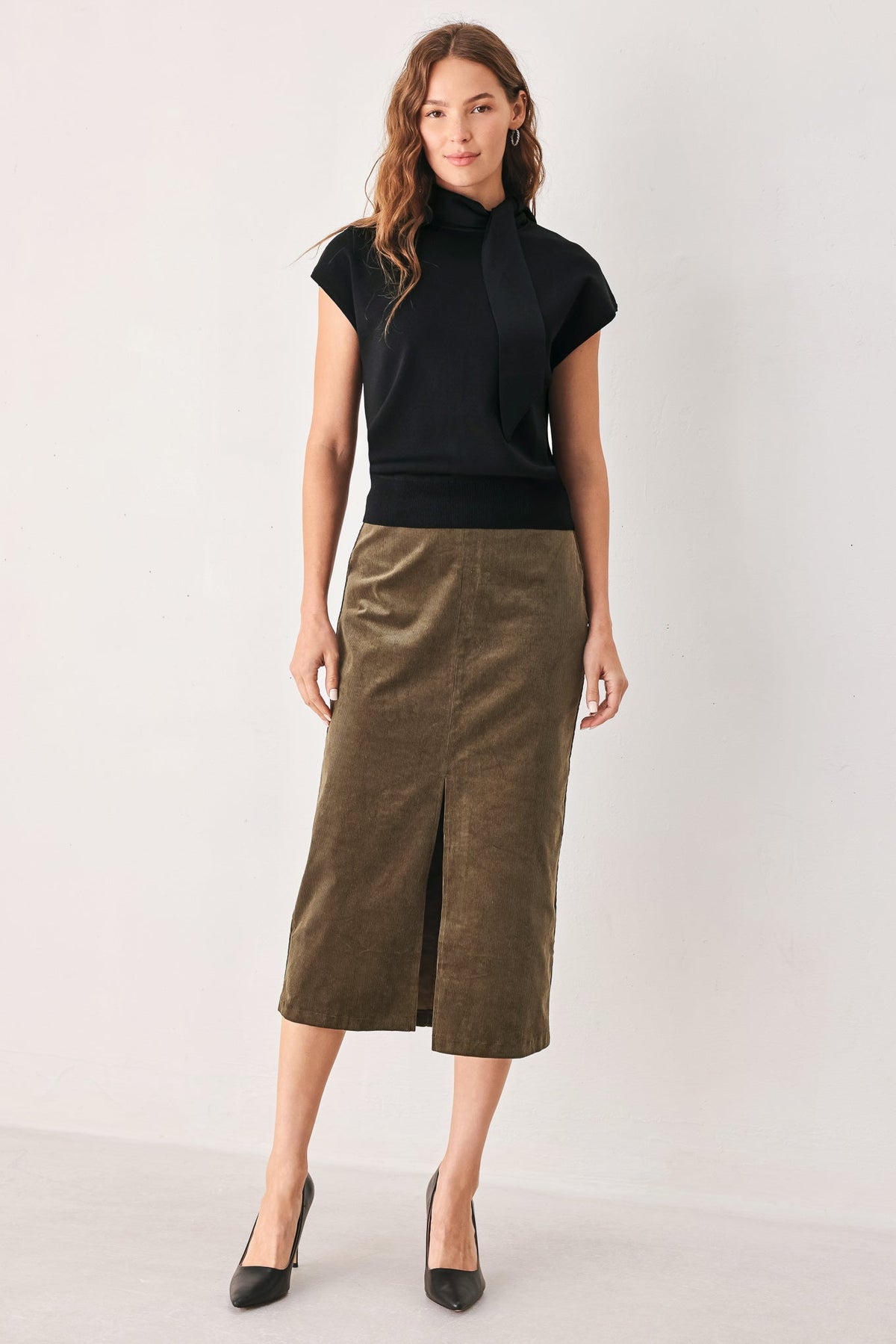 Black soft knit top with scarf-style neck tie and short cap sleeves