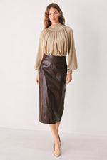 Taupe draped knit sweater top with long balloon sleeves and gathered neckline