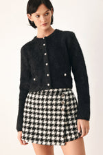 Black fuzzy cropped cardigan with button-front and round neckline