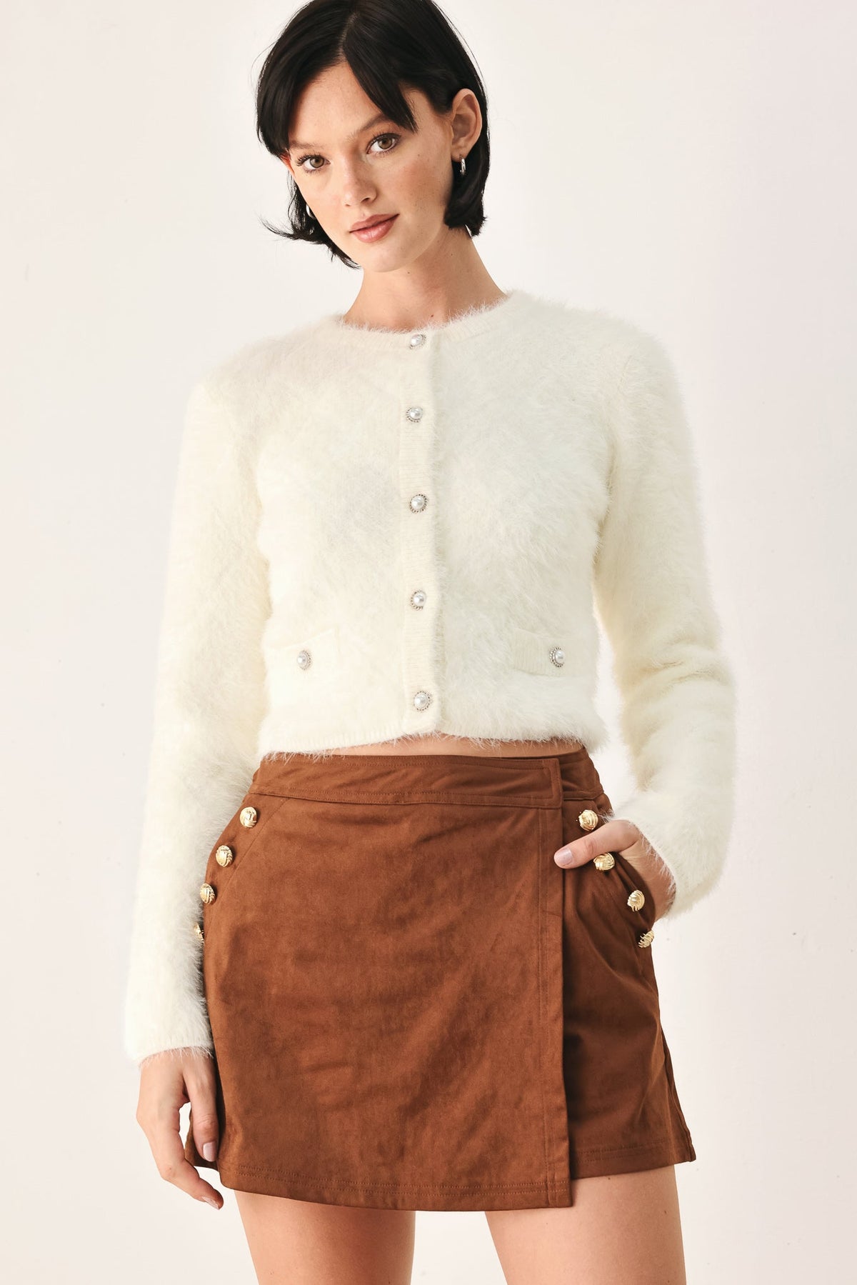 Ivory fuzzy cropped cardigan with button-front and long sleeves