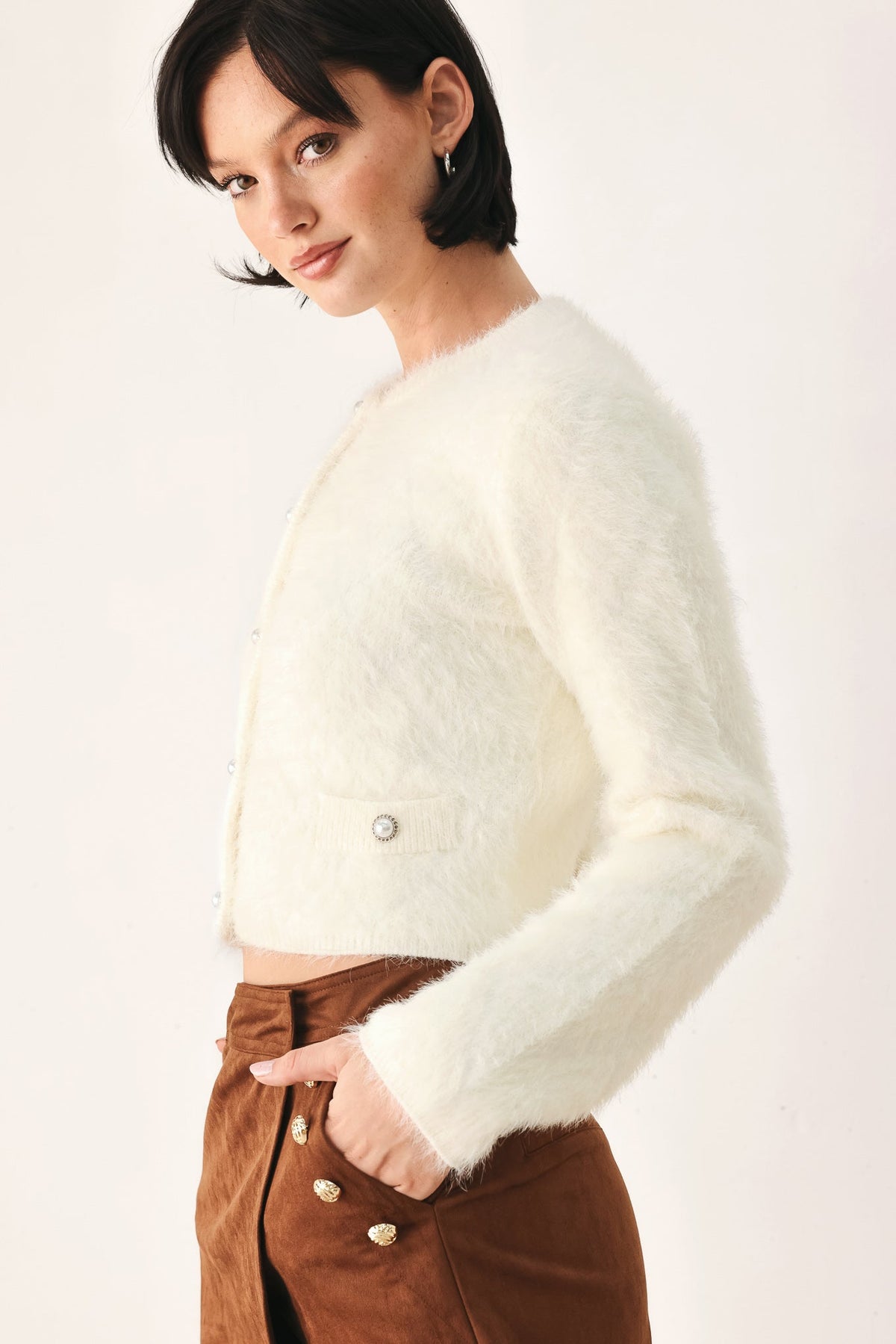Ivory cropped cardigan with round buttons and long sleeves
