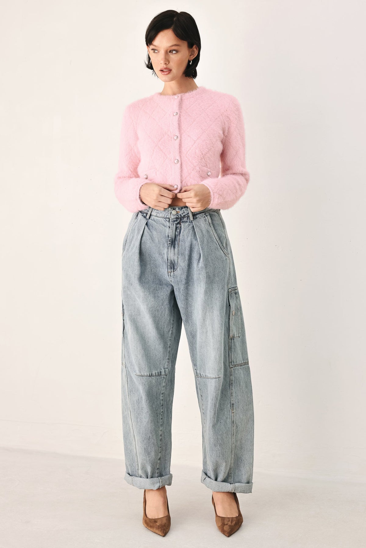 Pink cropped cardigan with button front and long sleeves