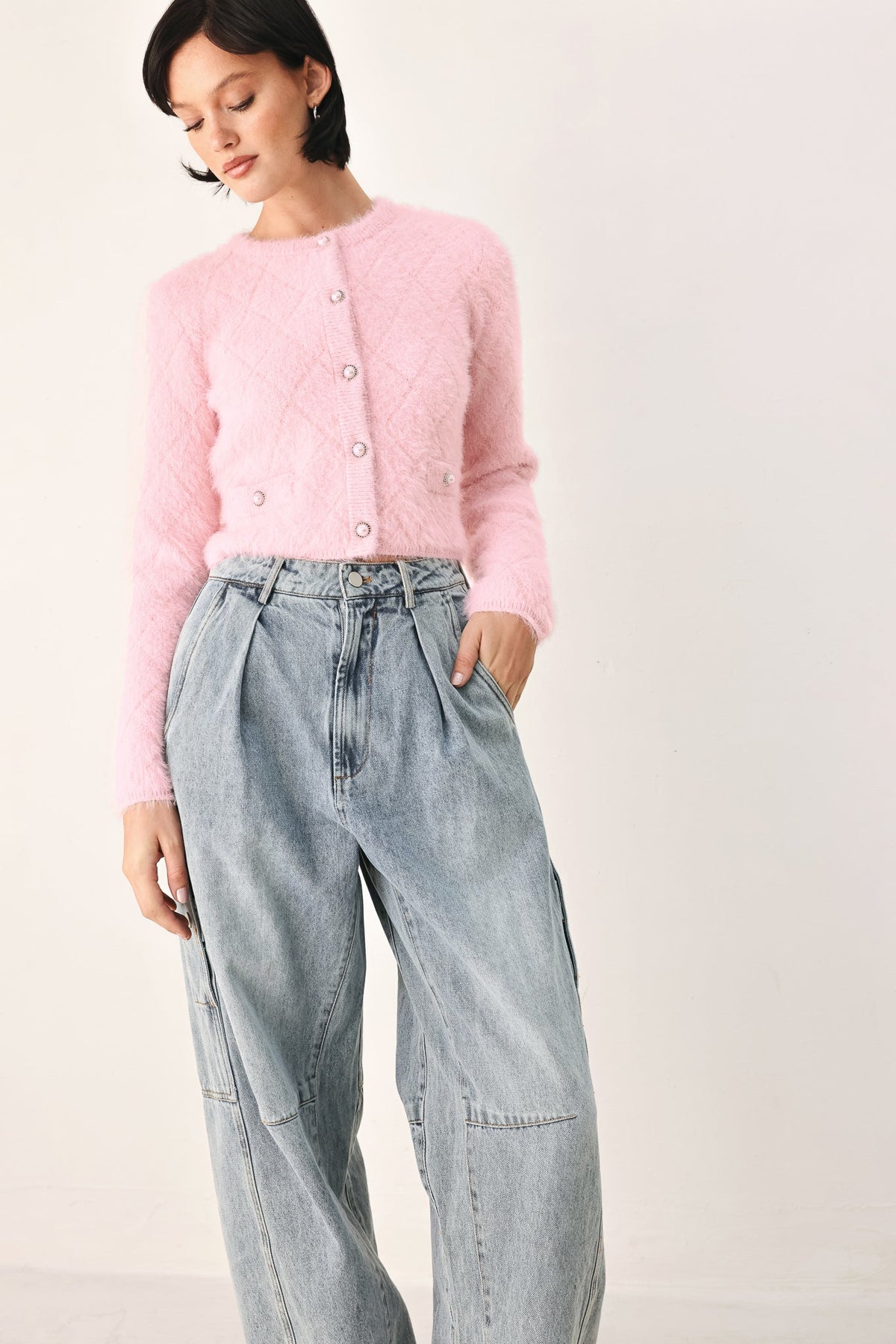Pink fuzzy cropped cardigan with button-front and round neckline