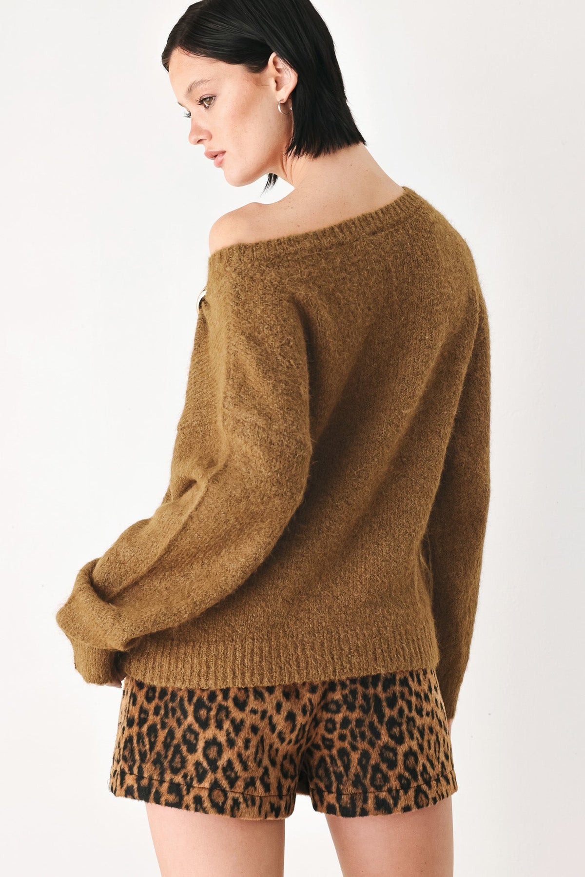 Camel-brown one-shoulder cinched neck sweater with clasp at neckline