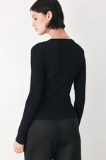 Black ribbed knit sweater top, back view, with long sleeves and crew neckline