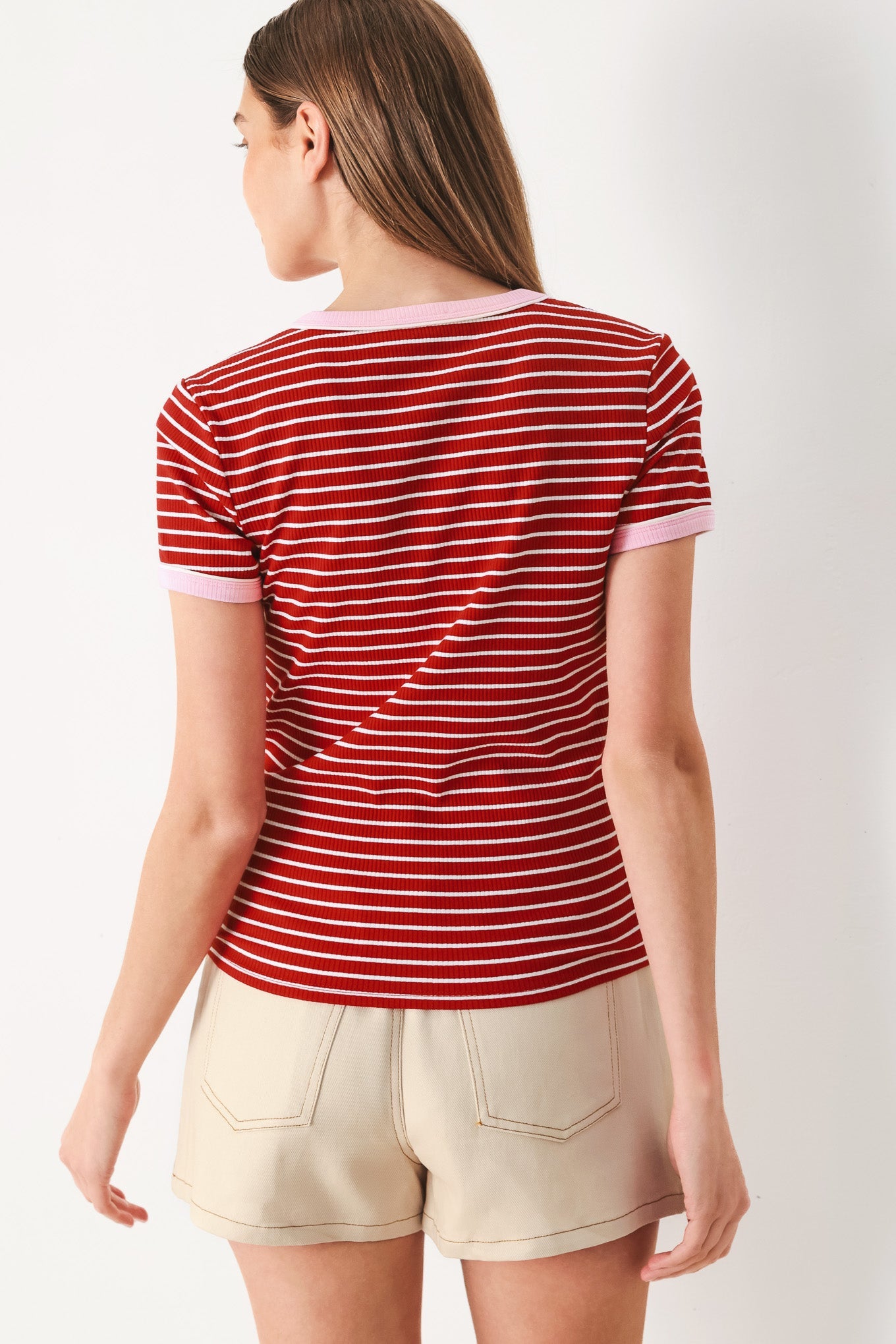Red and white striped knit top with crew neck and short sleeves, pink rib trim (back)