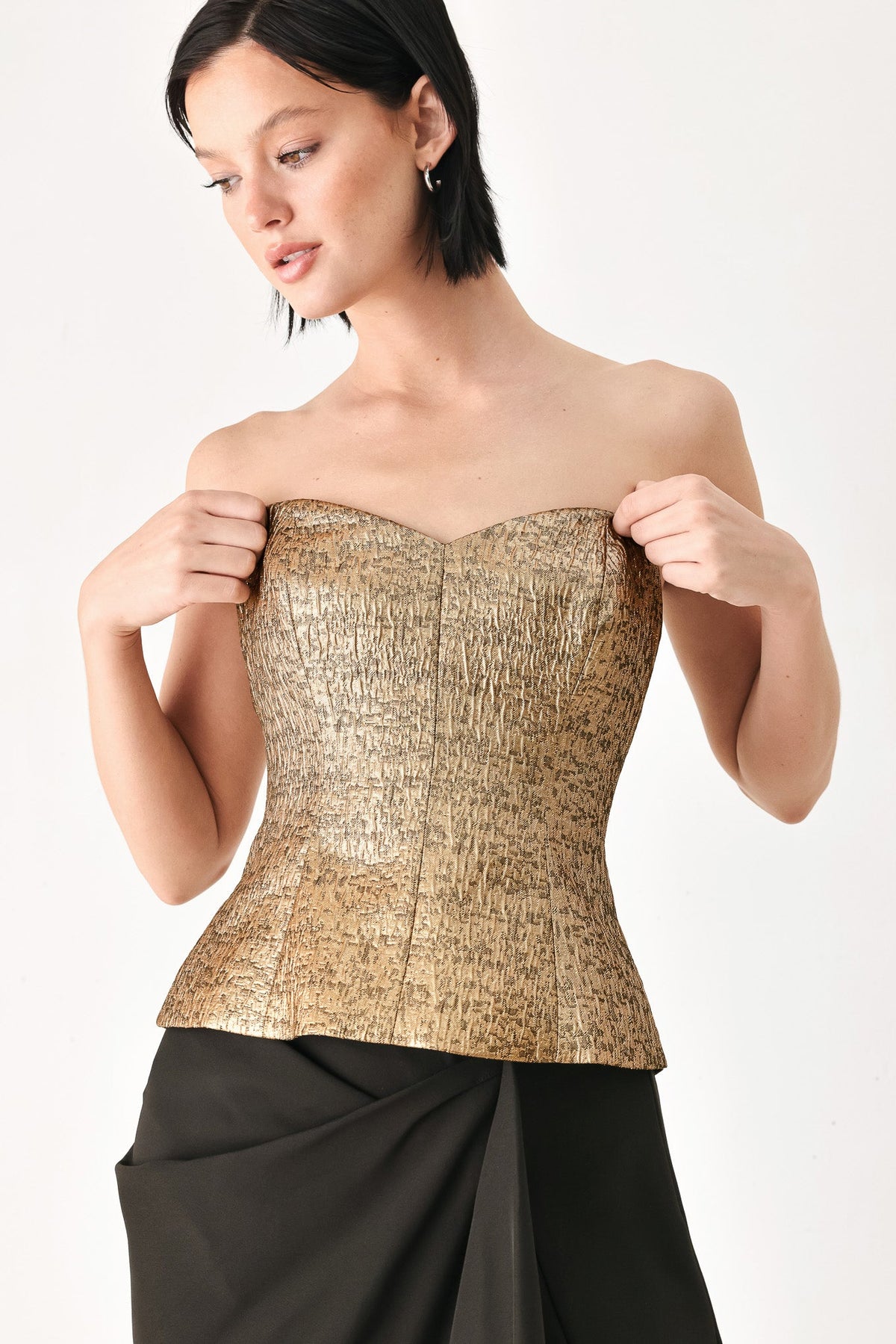Gold metallic sweetheart tube top with fitted peplum hem