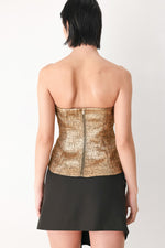 Gold metallic tube top with strapless corset back and center zipper, peplum hem