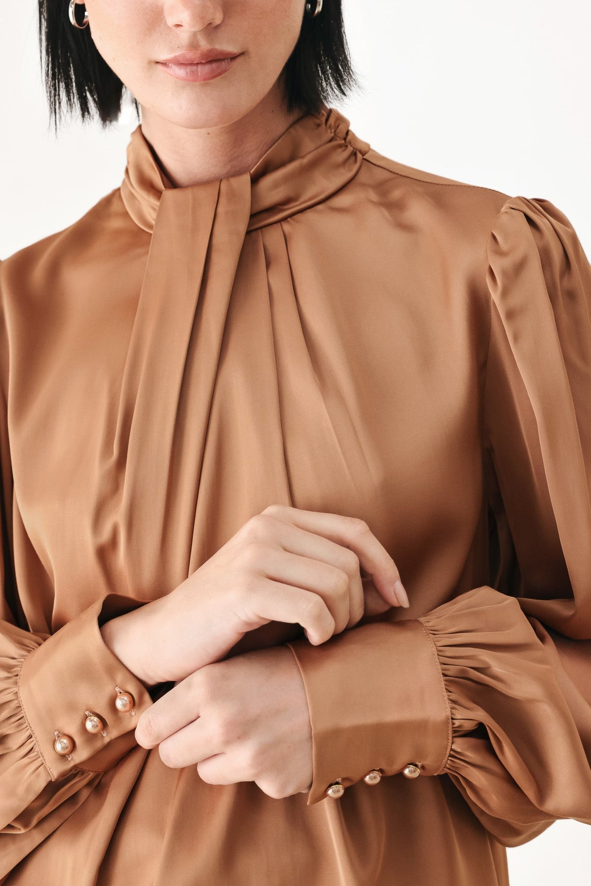Bronze high-neck blouse with tie collar and buttoned cuff puff sleeves