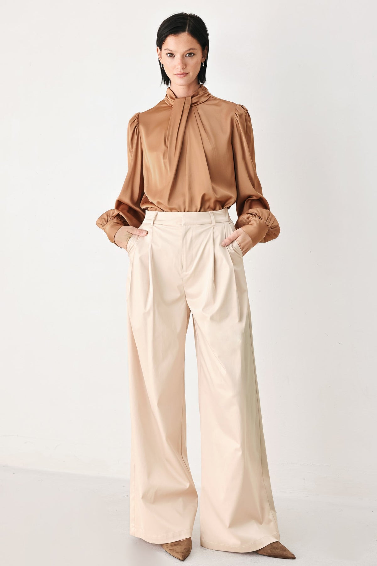 Bronze high-neck blouse with bow tie collar and long puff sleeves