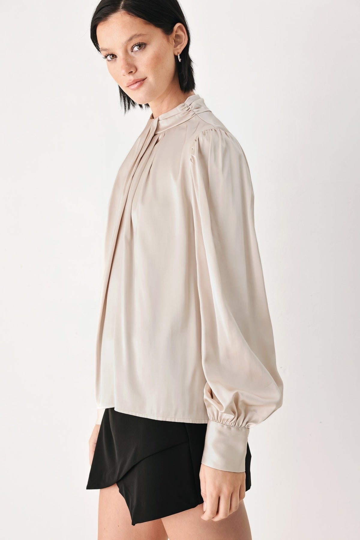 Champagne high-neck blouse with pleated front, long balloon sleeves, elastic cuffs