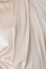 Champagne satin blouse fabric close-up with smooth sheen and soft drape