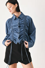Indigo denim button-down top with ruched front, collar, and long sleeves