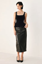 Black velvet peplum top with jeweled square neckline, sleeveless