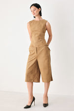Camel faux suede sleeveless top with curved peplum hem and waist seam