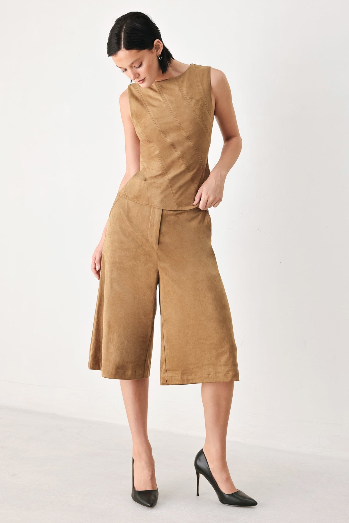 Camel faux suede sleeveless top with side panel seam and peplum waist