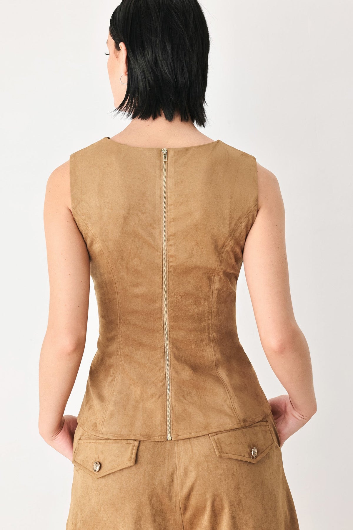 Back view: camel faux suede sleeveless top with center back seam and zipper