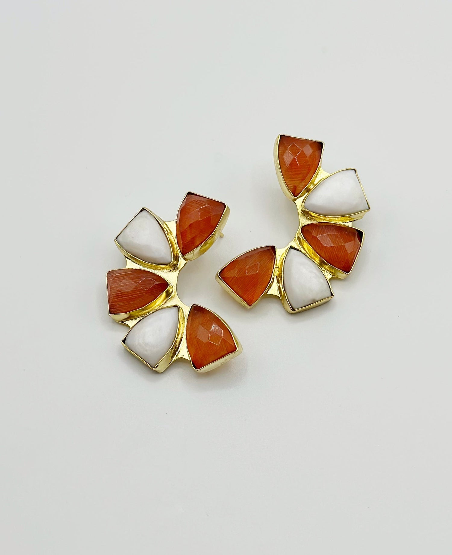 Orange and white mosaic flower earrings with gold-tone metal settings