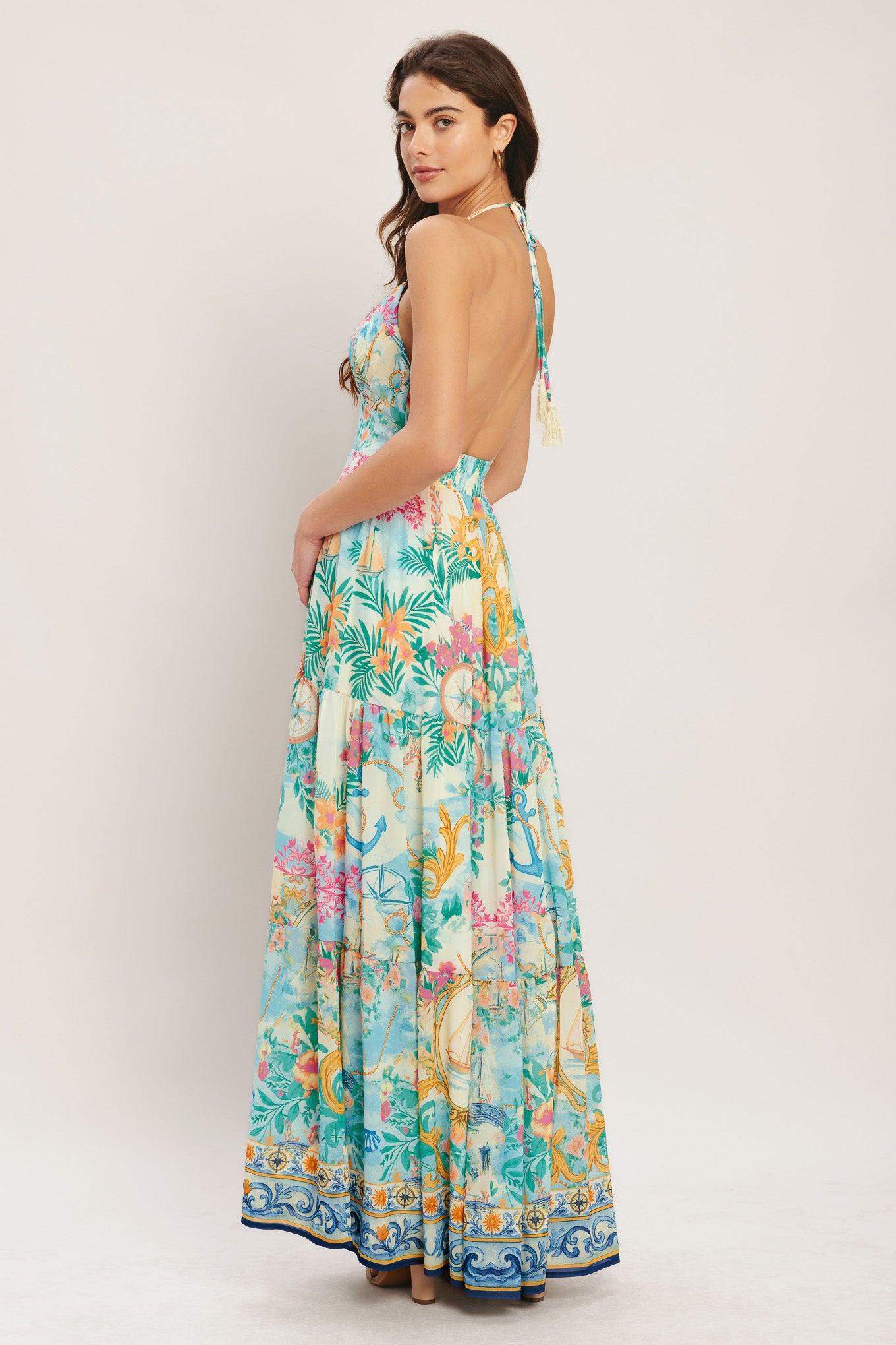 Women's woven maxi dress, side view with multicolor floral print and tiered skirt