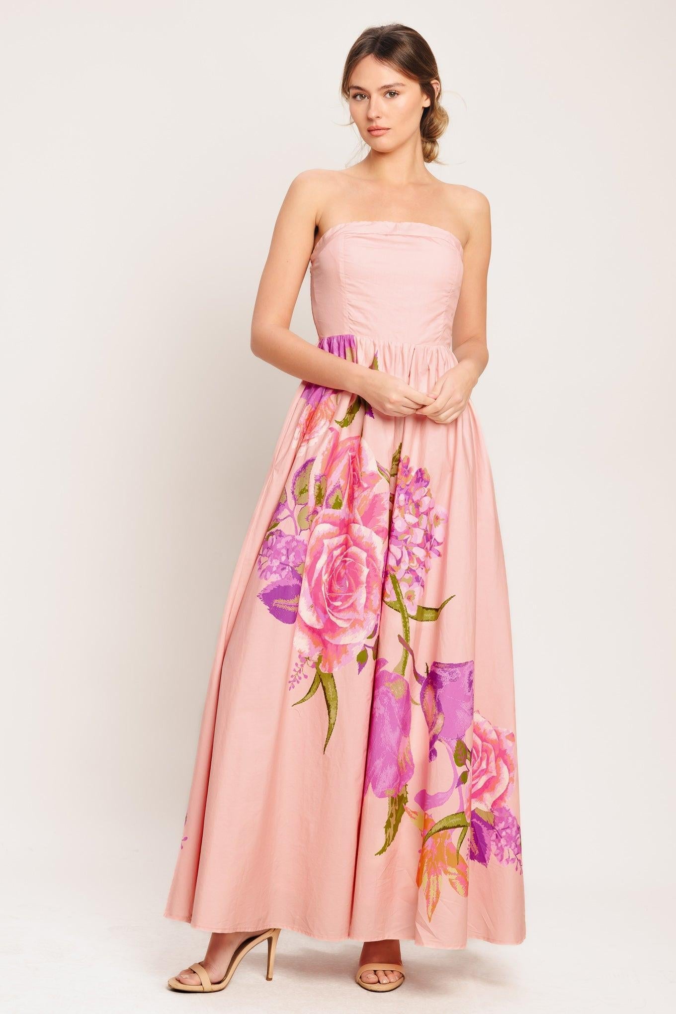 Light pink strapless maxi dress with smocked bodice and purple-pink floral print
