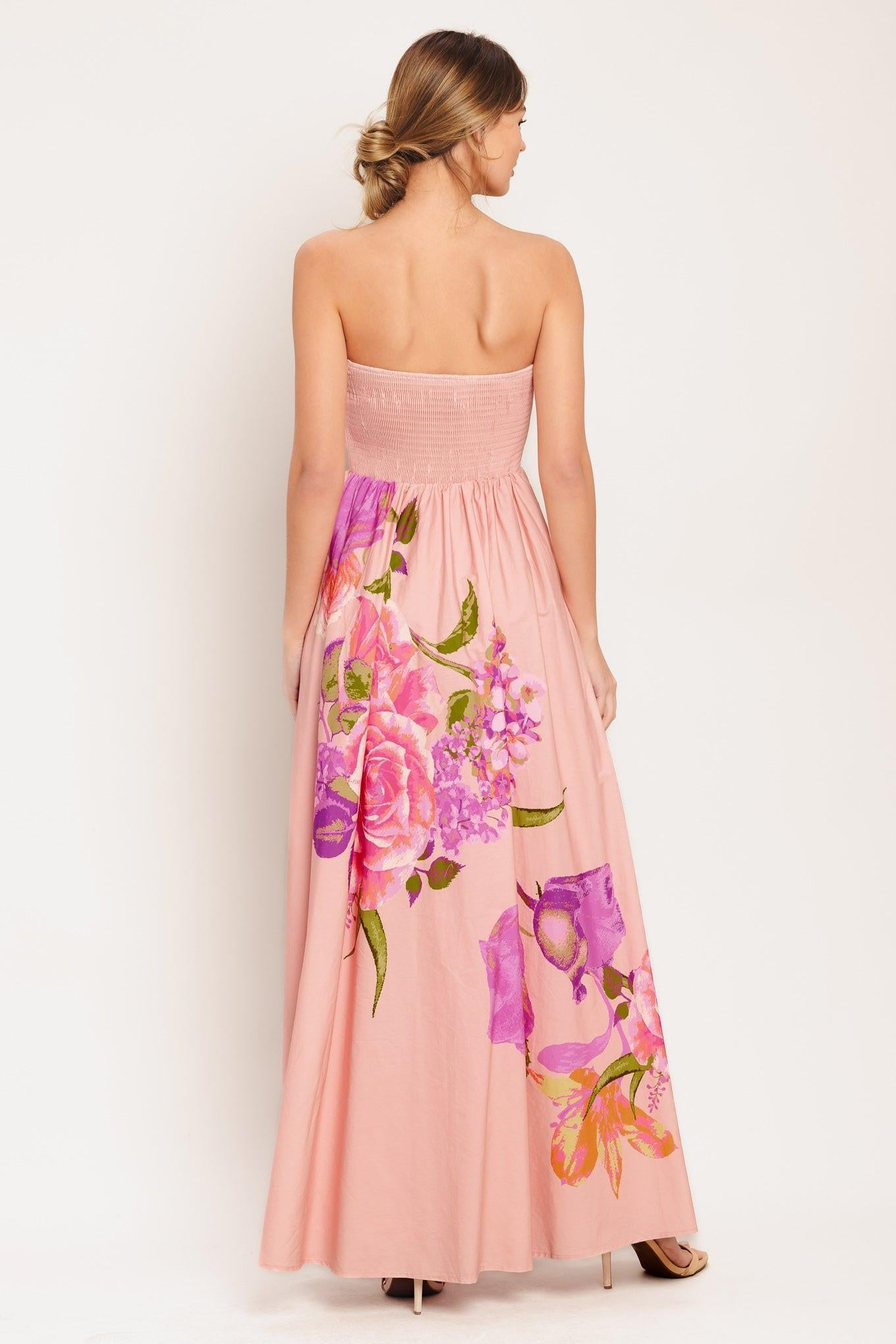 Light pink strapless maxi dress, back view, smocked bodice and floral skirt