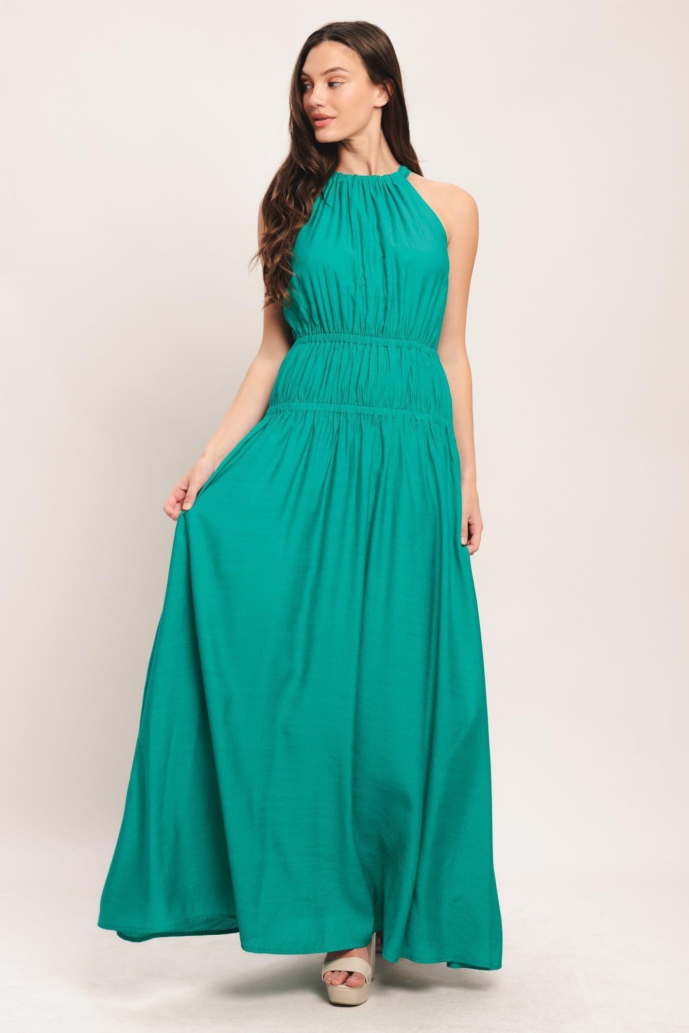Teal woven maxi dress with halter neckline and smocked waist tiered skirt