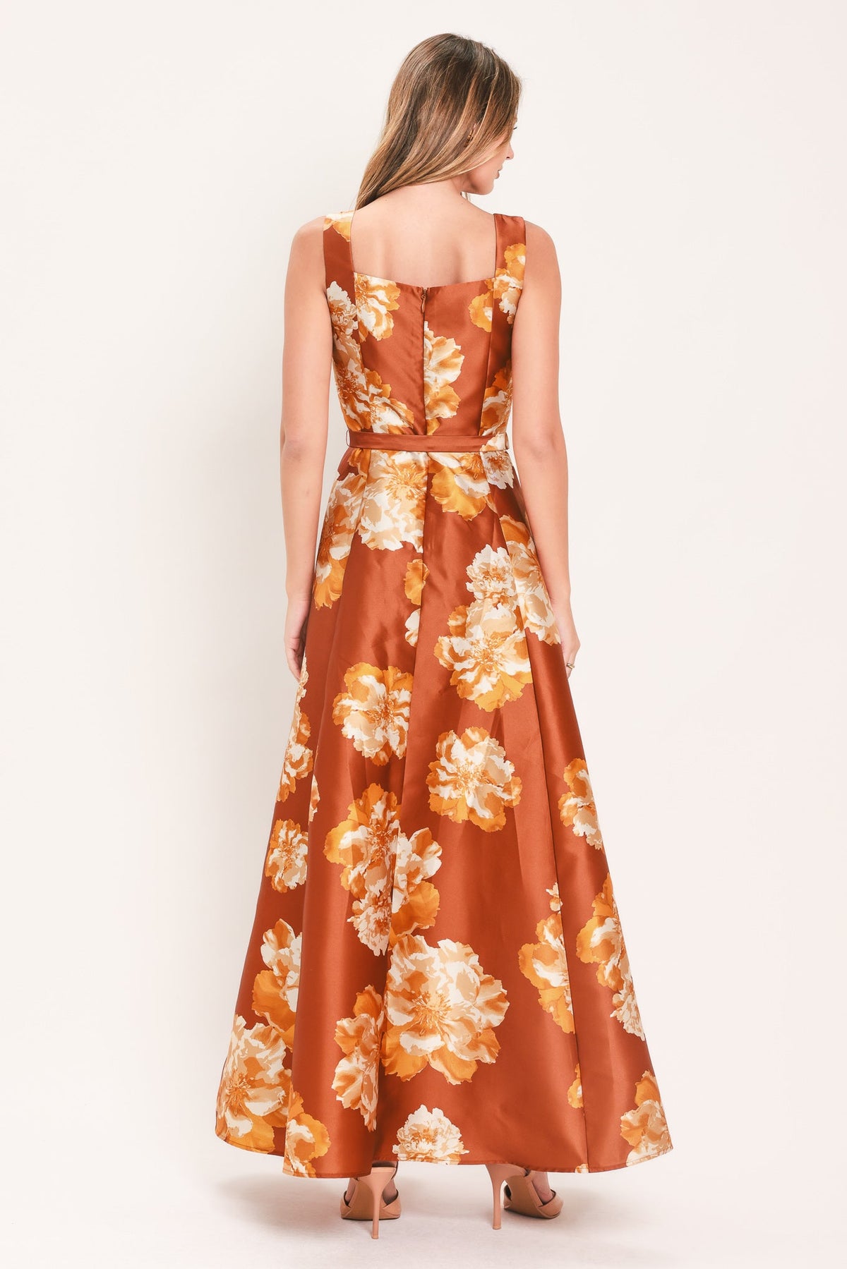 Rust floral maxi dress back view, sleeveless square straps, cinched waist belt