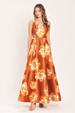Rust floral maxi dress with square neckline, sleeveless cut, cinched waist belt