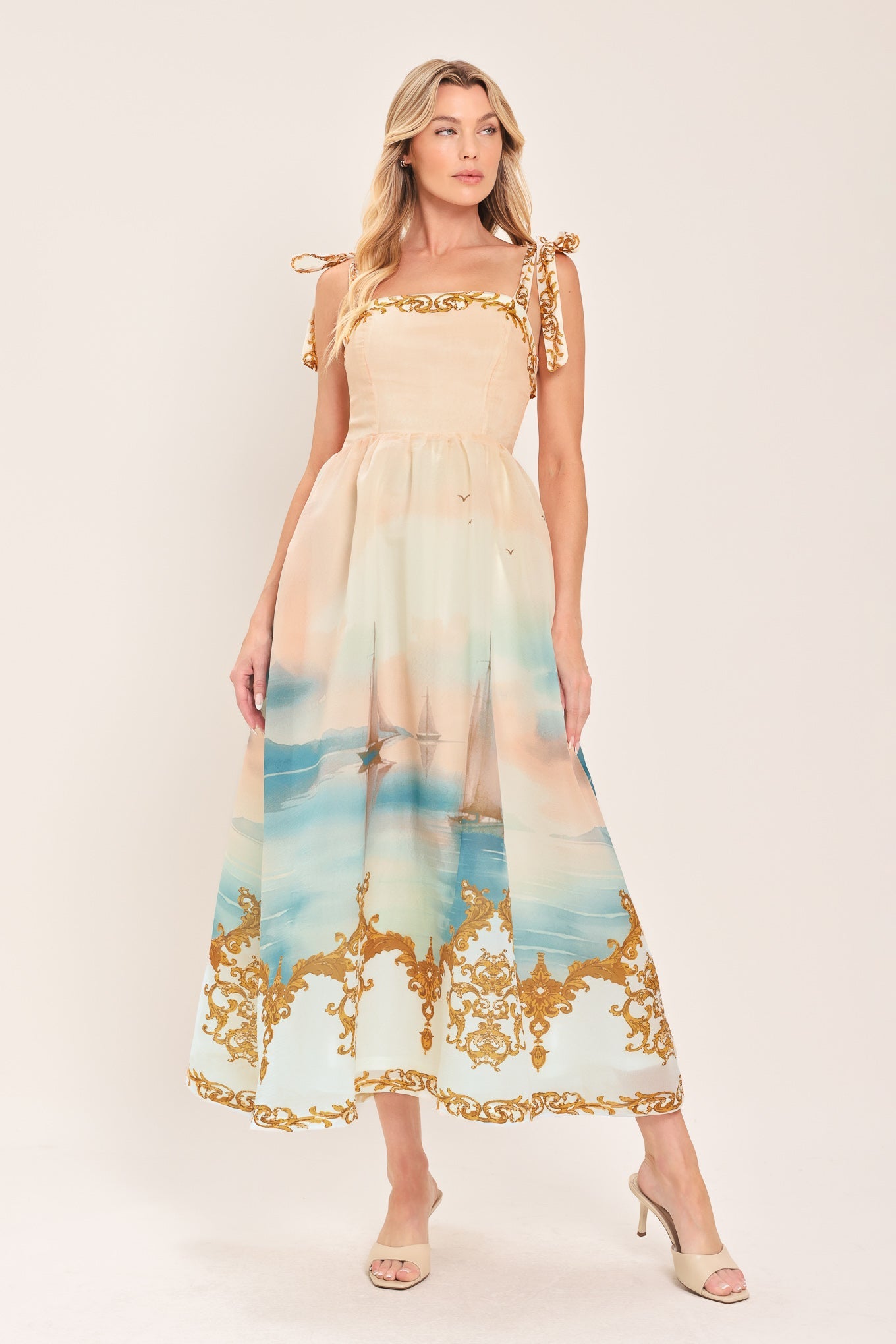 Woven midi dress with square neckline and gold tie straps, coral and blue harbor graphic