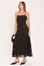 Dark brown sleeveless strappy ankle dress with floral lace texture and fitted silhouette