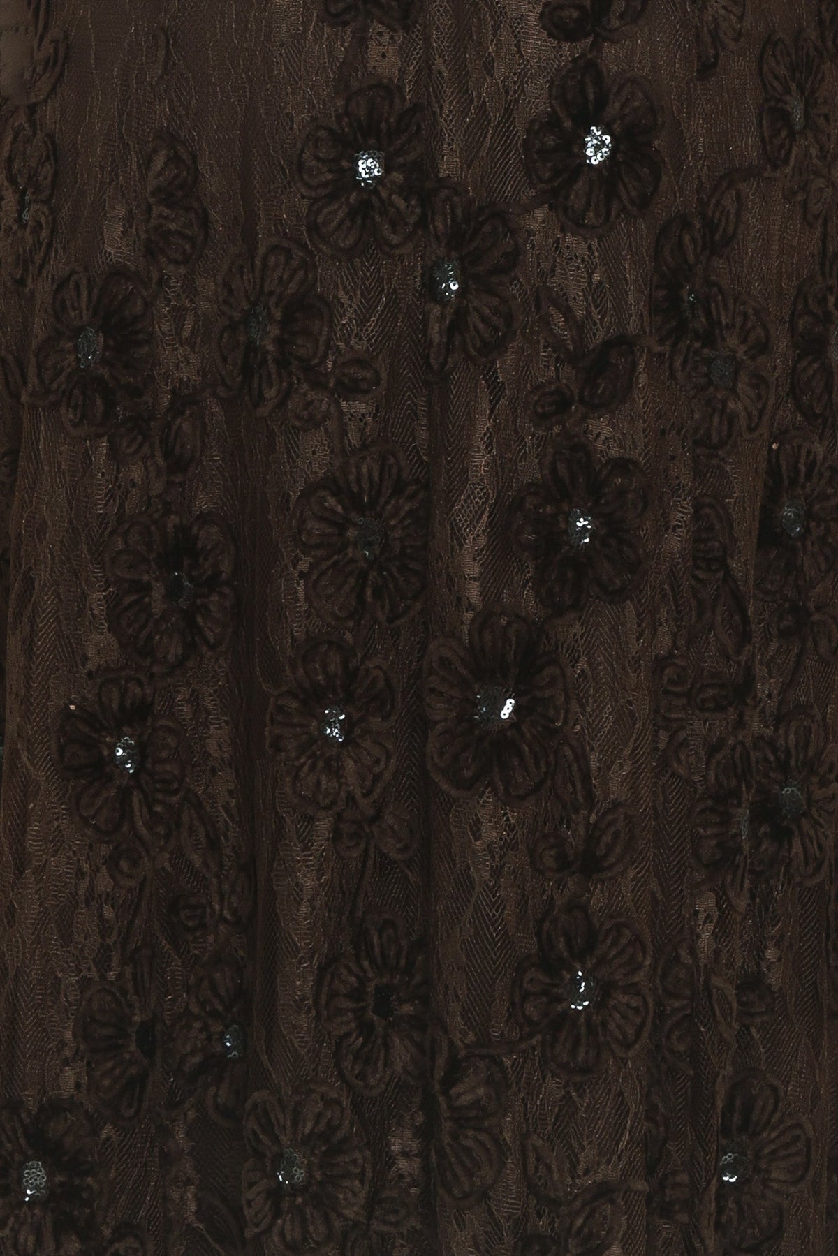 Close-up: dark brown floral embroidered lace with small crystal-like accents
