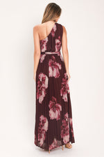 Burgundy one-shoulder maxi dress with pink floral print, open back and tied waist
