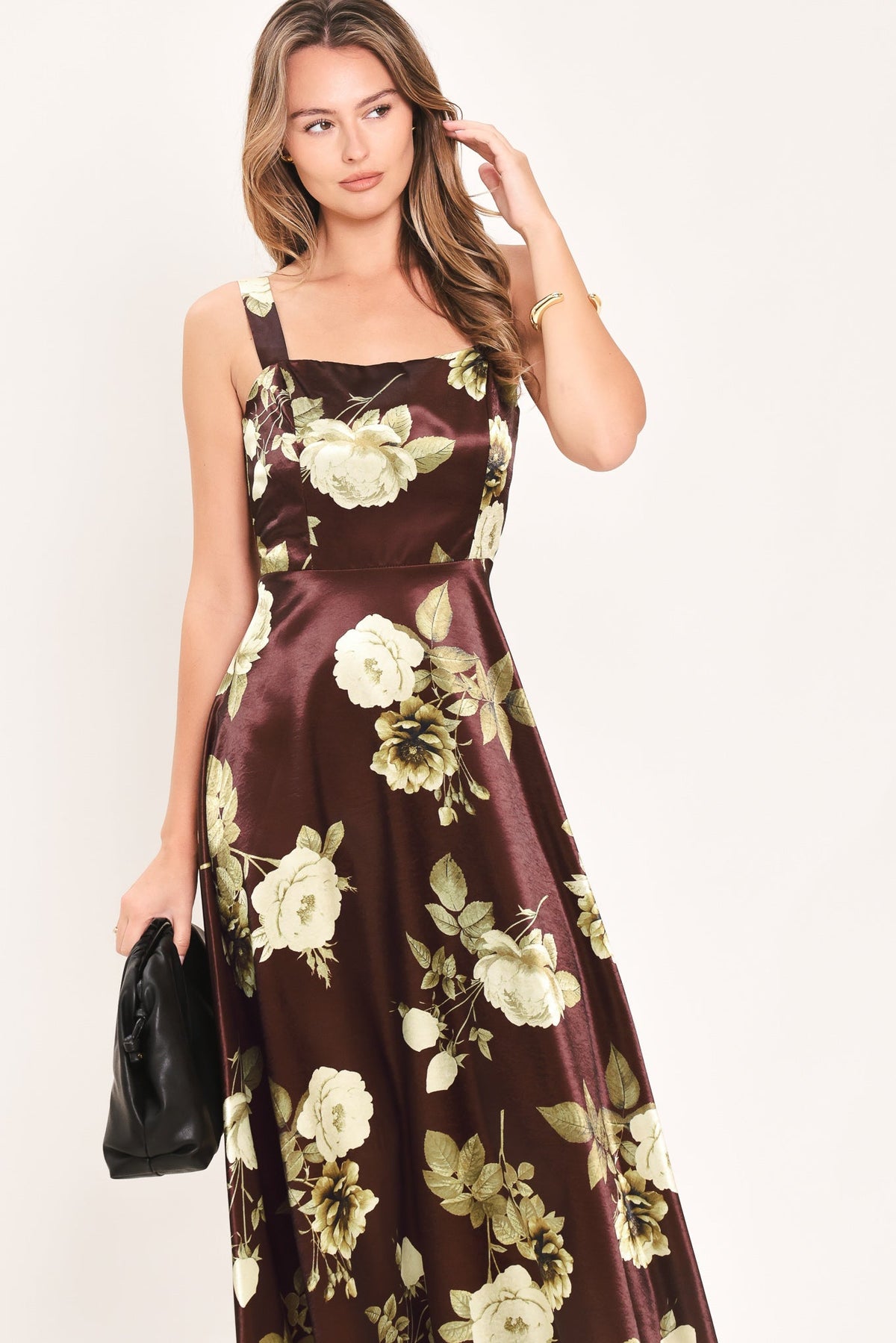 Wine floral woven midi dress with square neckline, spaghetti straps, and gathered skirt.