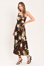 Wine floral midi dress with spaghetti straps, gathered waist seam, and full skirt.