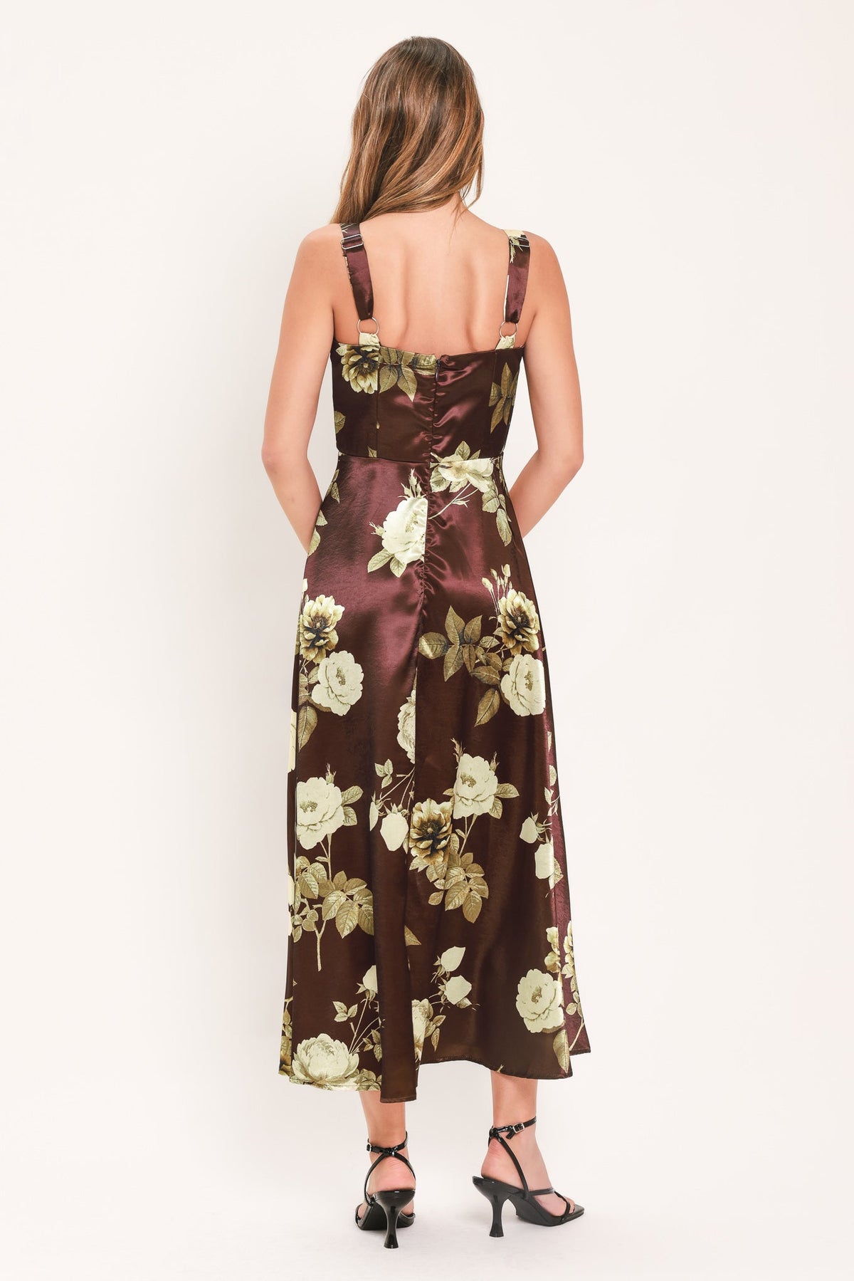 Back view of wine woven midi dress with thin straps and cream floral print.